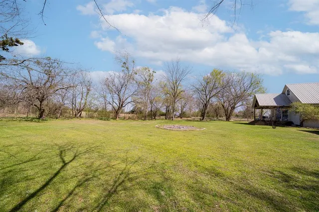 a view of swimming pool with outdoor seating