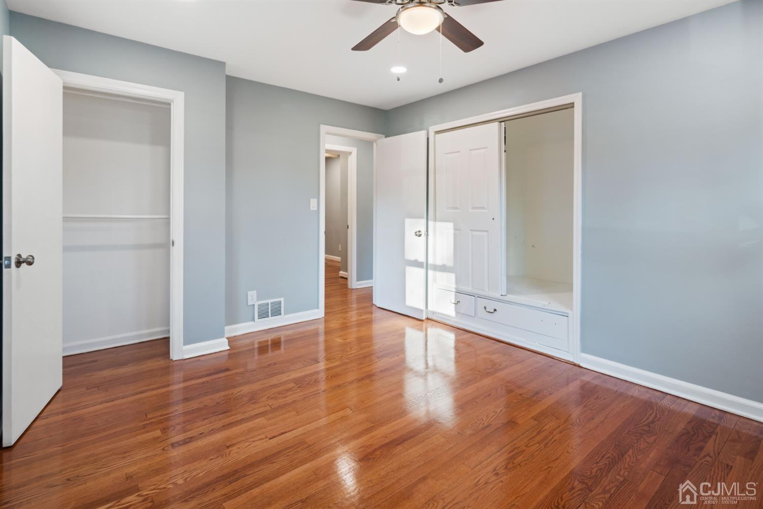 282 Lawrence Avenue North Plainfield, NJ 07063 - Photo 11 of 27 wooden floor in an empty room with a window