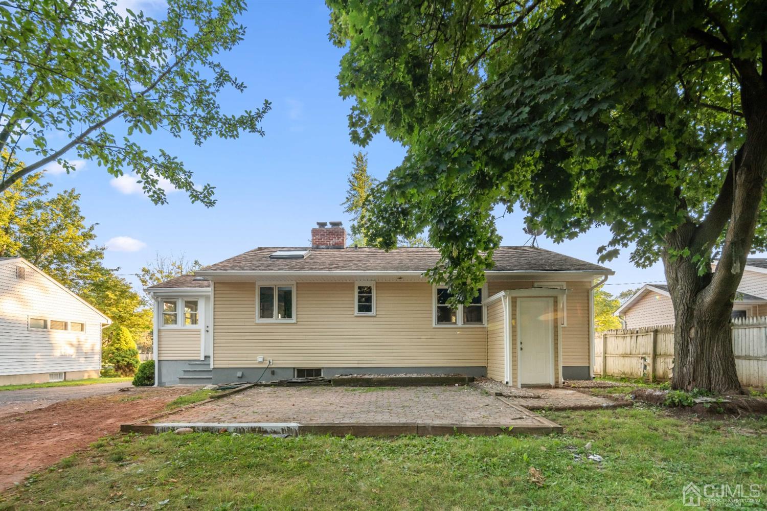 282 Lawrence Avenue North Plainfield, NJ 07063 - Photo 3 of 27 a front view of a house with a yard