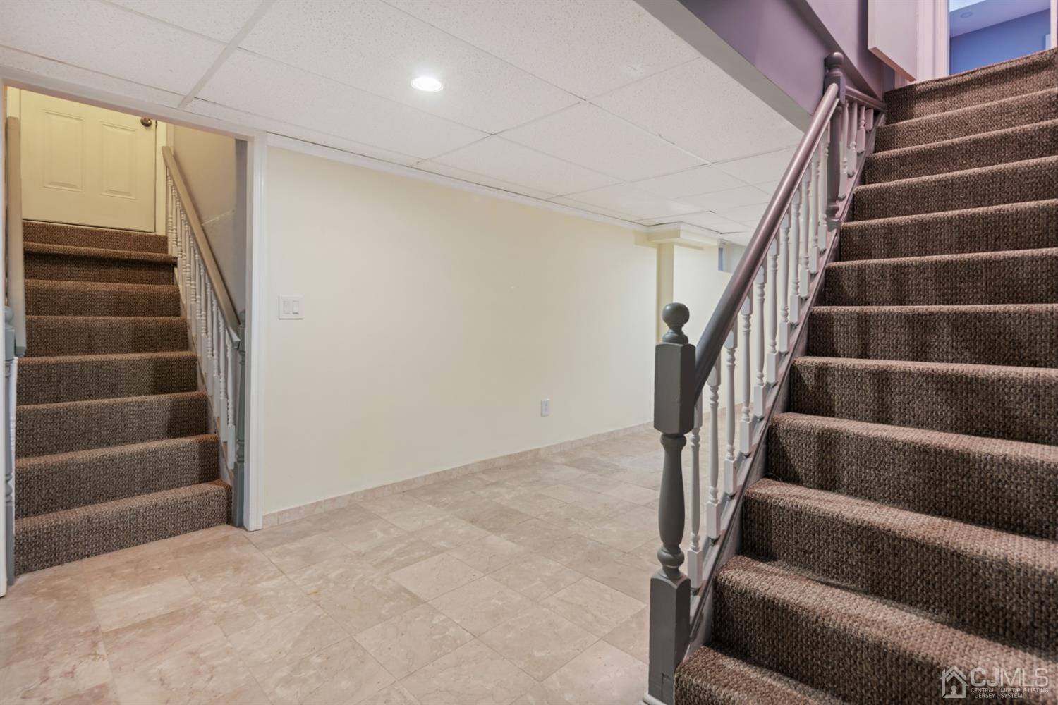 282 Lawrence Avenue North Plainfield, NJ 07063 - Photo 21 of 27 a view of an empty room with stairs