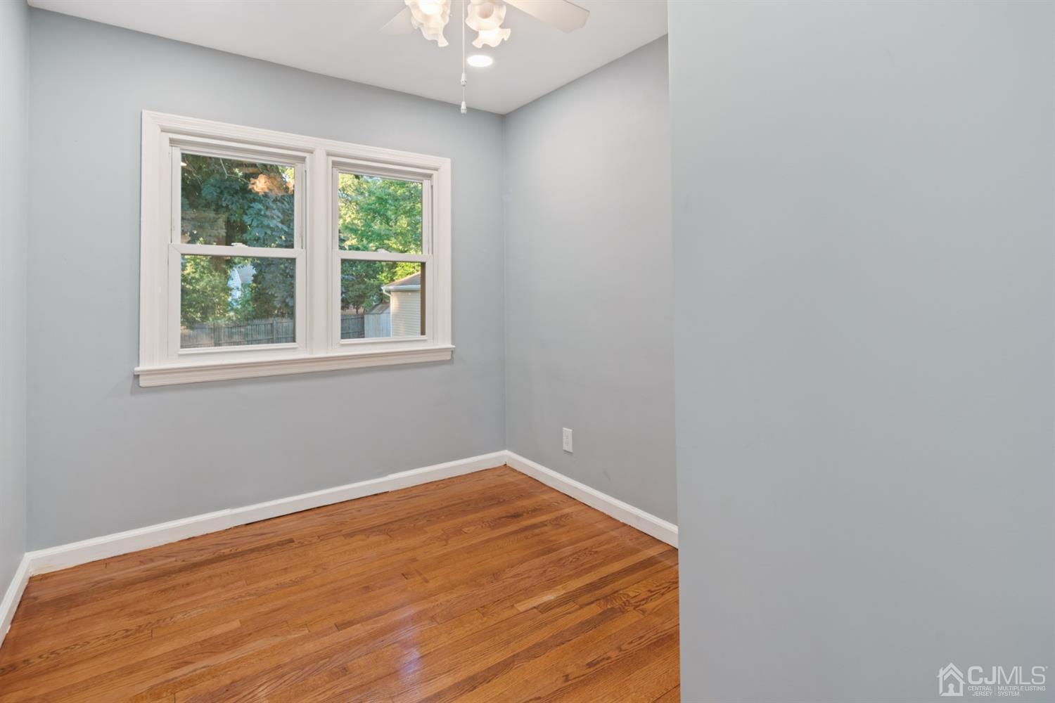 282 Lawrence Avenue North Plainfield, NJ 07063 - Photo 10 of 27 an empty room with a window