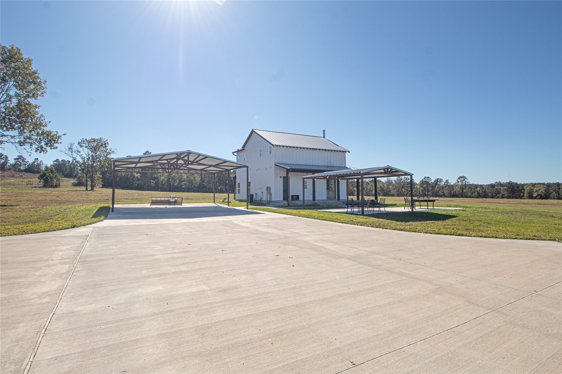 1275 Castlewood Road Livingston, TX 77351 - Photo 21 of 50 a view of a swimming pool with an outdoor space and seating area