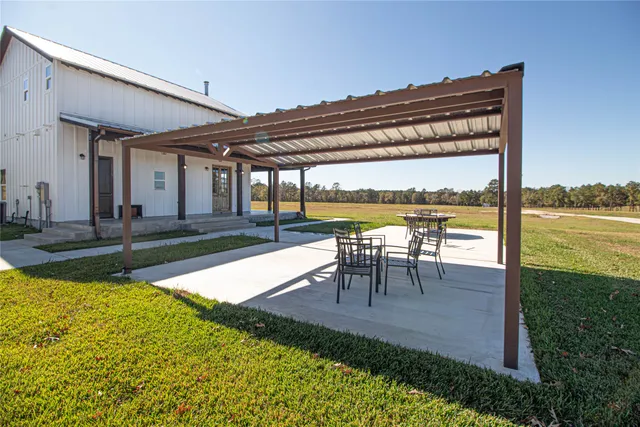 a view of a swimming pool with a porch