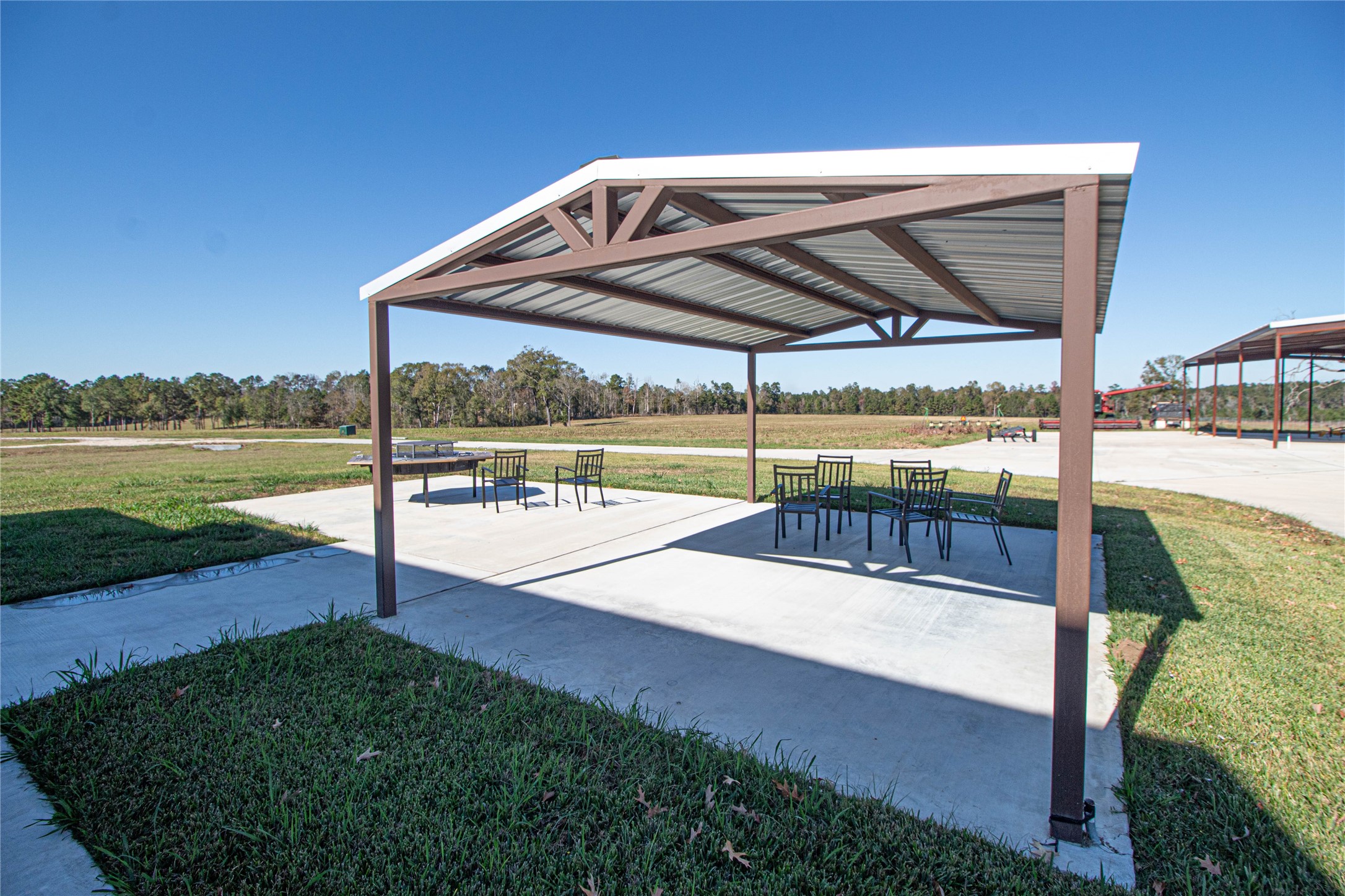 1275 Castlewood Road Livingston, TX 77351 - Photo 25 of 50 a view of a swimming pool with a porch
