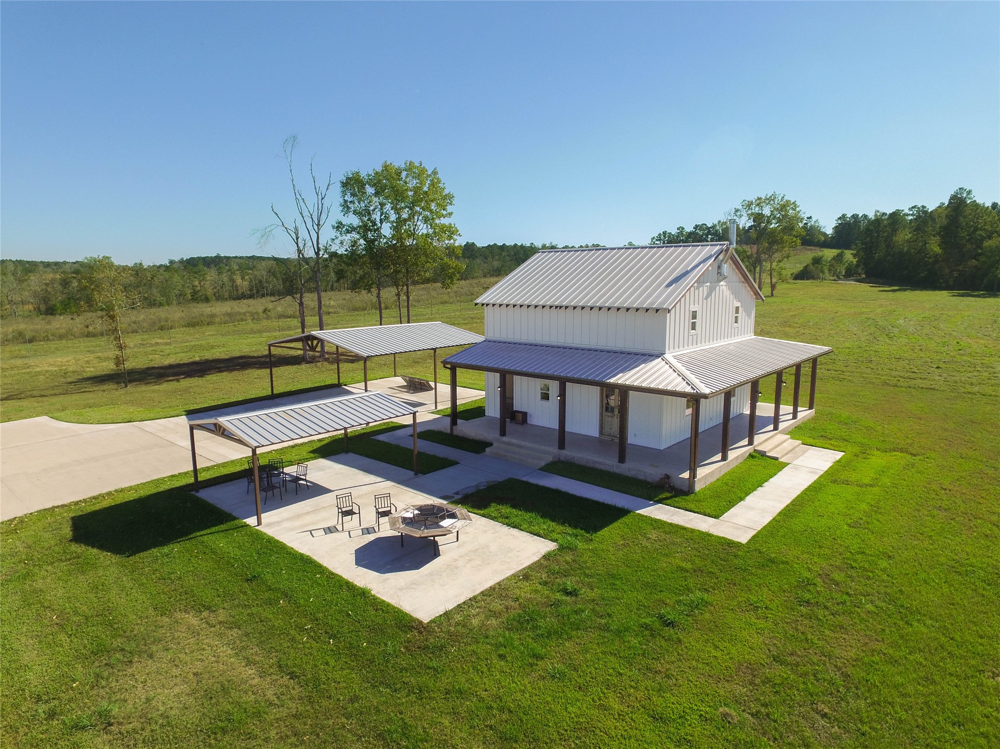 1275 Castlewood Road Livingston, TX 77351 - Photo 4 of 50 an aerial view of a house with a garden
