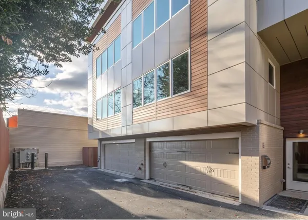 a view of a house with a garage