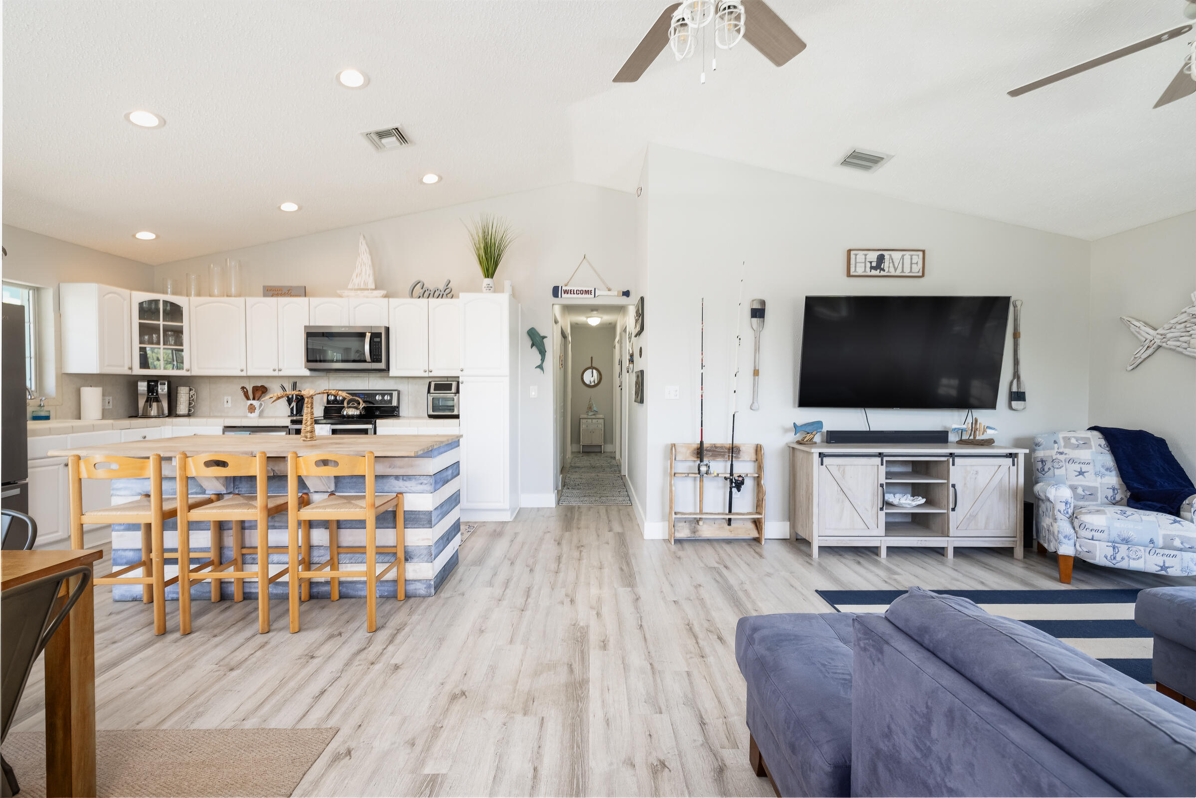 18 Bounty Lane Key Largo, FL 33037 - Photo 13 of 73 a living room with stainless steel appliances furniture and a flat screen tv