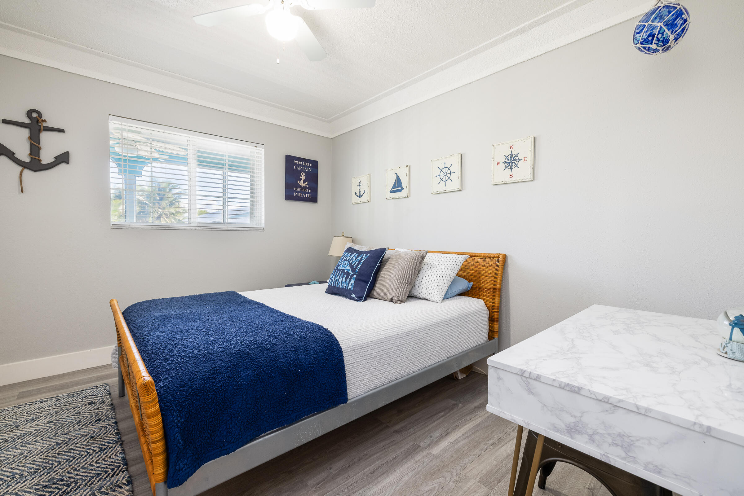 18 Bounty Lane Key Largo, FL 33037 - Photo 24 of 73 a bedroom with a bed and a table