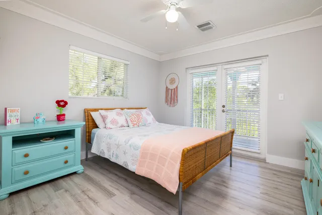 a bedroom with a bed and a table in it