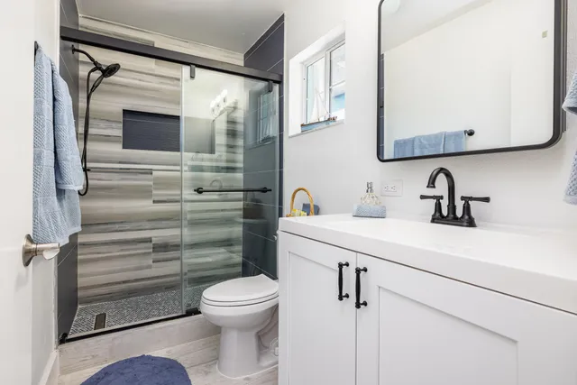 a view of a wooden deck with a yard