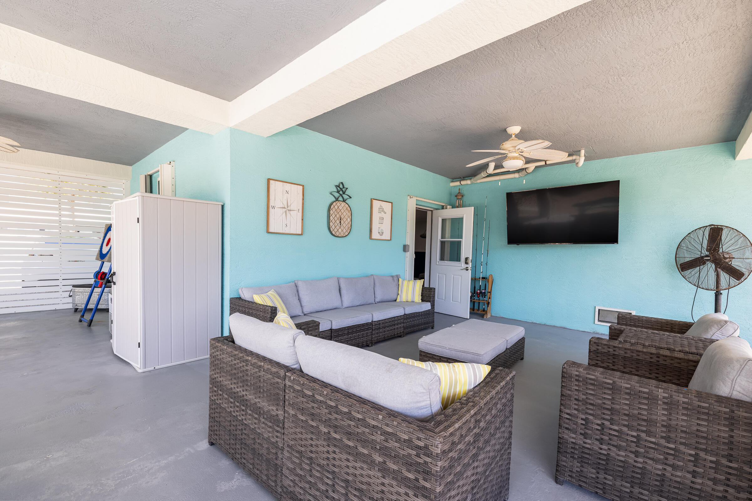 18 Bounty Lane Key Largo, FL 33037 - Photo 56 of 73 a living room with furniture and a flat screen tv