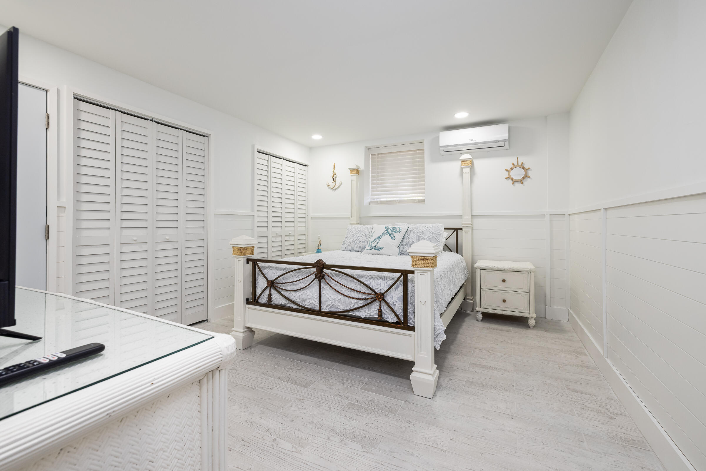 18 Bounty Lane Key Largo, FL 33037 - Photo 65 of 73 a bedroom with a bed and a dresser