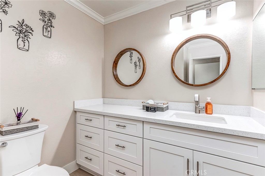 6401 Nohl Ranch Road, Unit 3 Anaheim, CA 92807 - Photo 31 of 48 Downstairs powder room