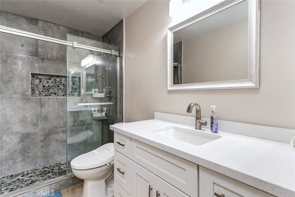 6401 Nohl Ranch Road, Unit 3 Anaheim, CA 92807 - Photo 46 of 48 Hallway bathroom