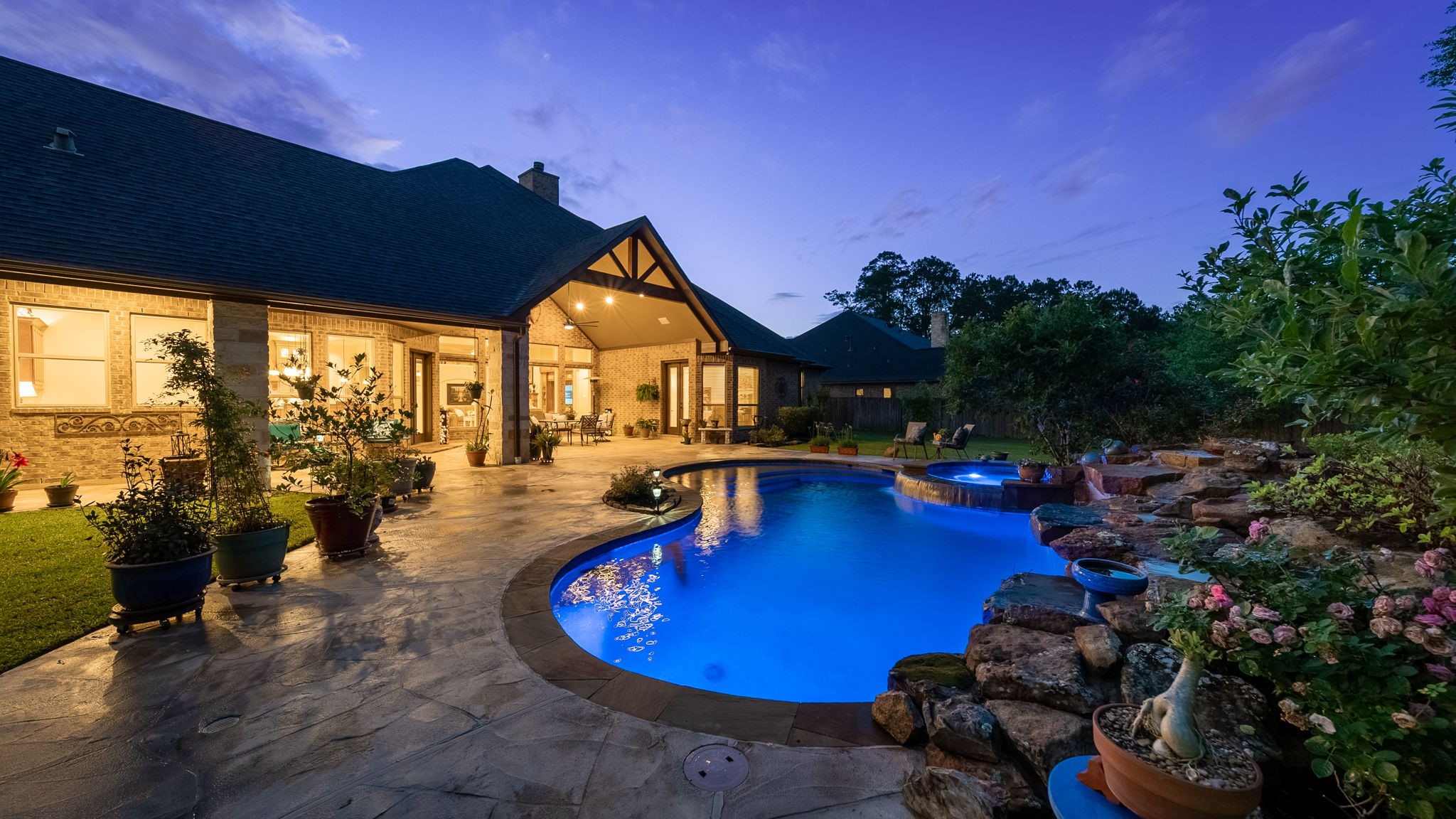 28502 Crawford Ridge Court Huffman, TX 77336 - Photo 41 of 50 a view of a swimming pool with sitting area