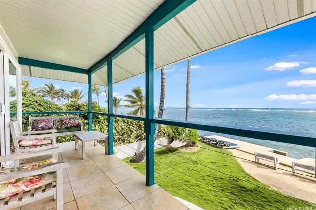 a view of swimming pool with a patio