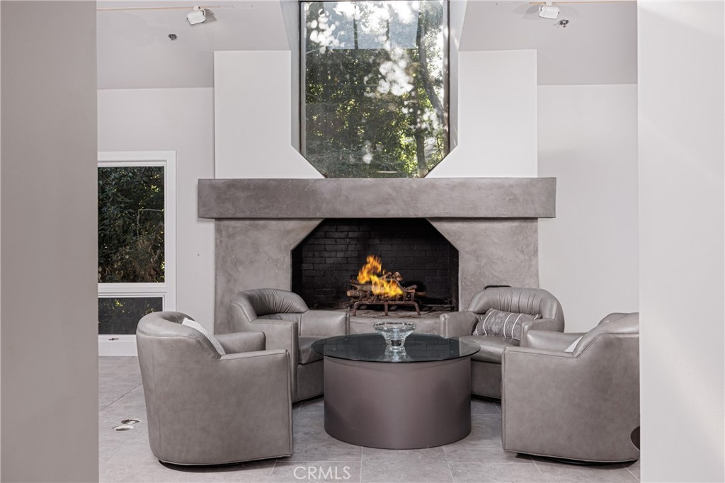 31561 Peppertree-Bend San Juan Capistrano, CA 92675 - Photo 12 of 58 a living room with furniture and a fireplace