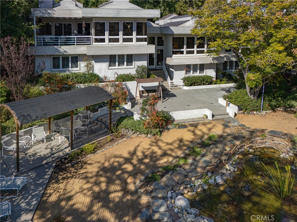31561 Peppertree-Bend San Juan Capistrano, CA 92675 - Photo 27 of 58 a front view of a house with a garden