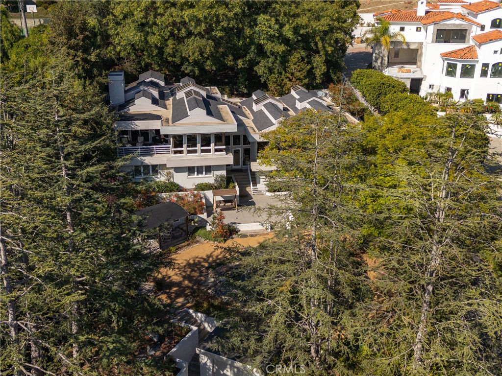 31561 Peppertree-Bend San Juan Capistrano, CA 92675 - Photo 32 of 58 a view of a house with a small yard and large trees