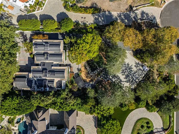 an aerial view of residential house with outdoor space