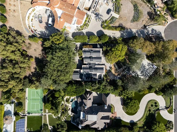 an aerial view of residential house with outdoor space