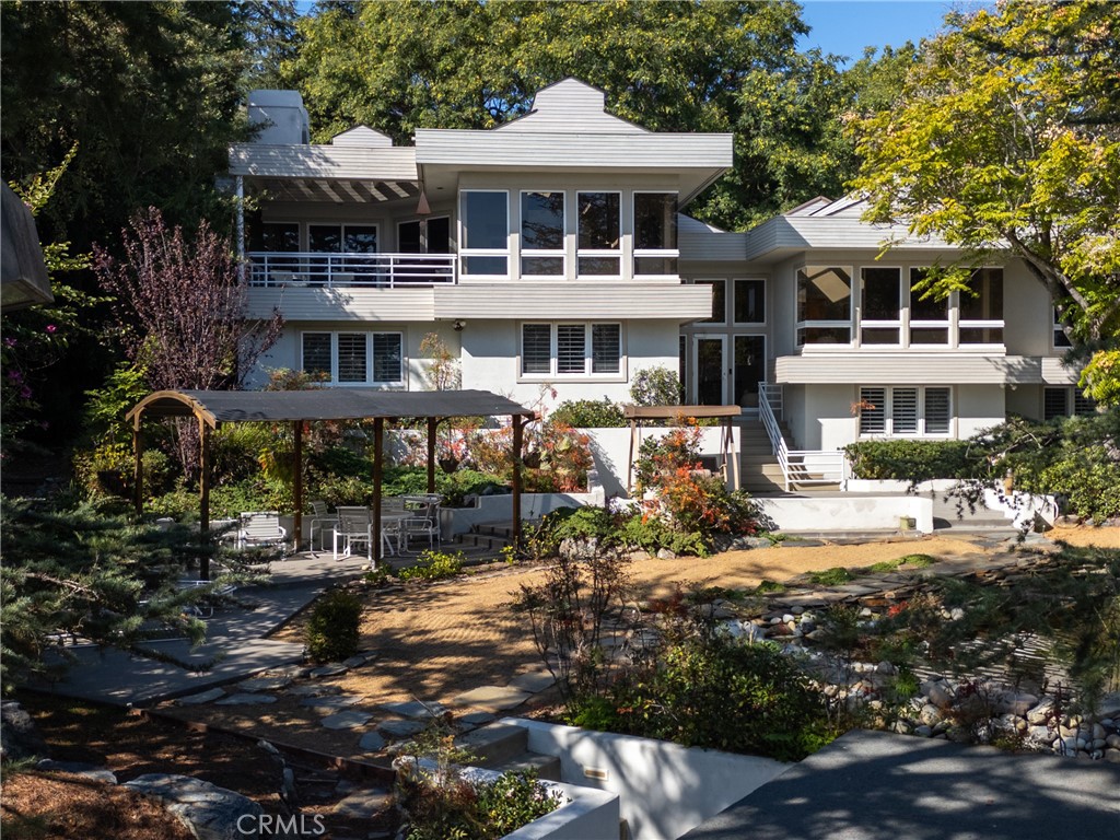 31561 Peppertree-Bend San Juan Capistrano, CA 92675 - Photo 40 of 58 a front view of a house with yard and sitting area