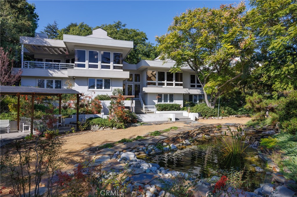 31561 Peppertree-Bend San Juan Capistrano, CA 92675 - Photo 44 of 58 a front view of a house with a garden