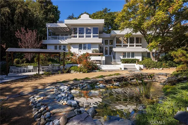 a view of a backyard of a house