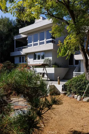 a view of backyard with green space