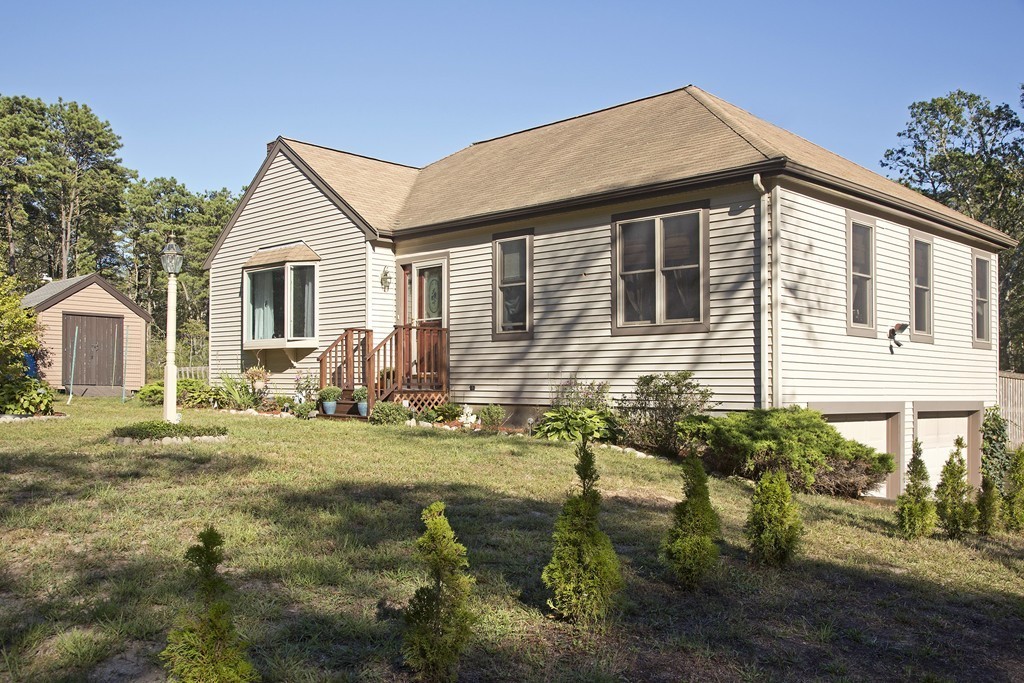 48 Roxy Cahoon Road Plymouth, MA 02360 - Photo 2 of 14 a view of a house with backyard