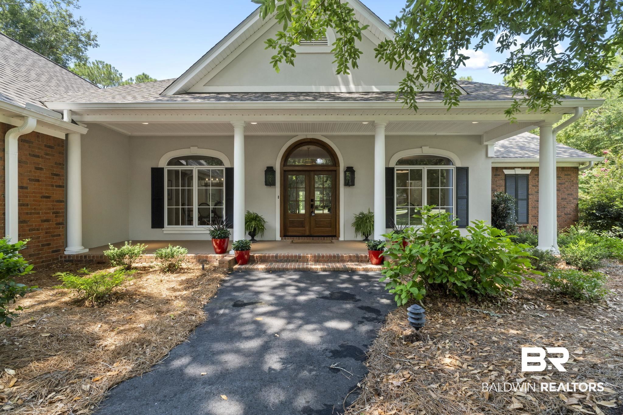 4451 Millhouse Road Gulf Shores, AL 36542 - Photo 1 of 50 View of exterior entry with french doors