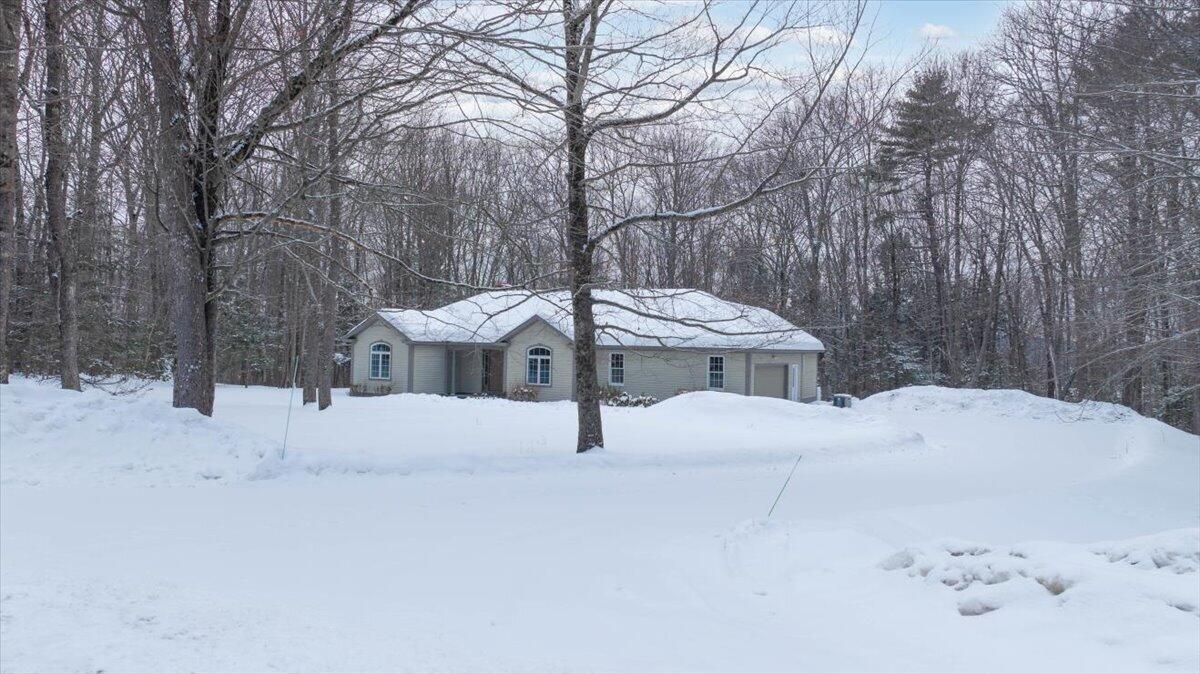 63 Maple Ridge Drive Winthrop, ME 04364 - Photo 3 of 69 05-exterior-front-elevated-1