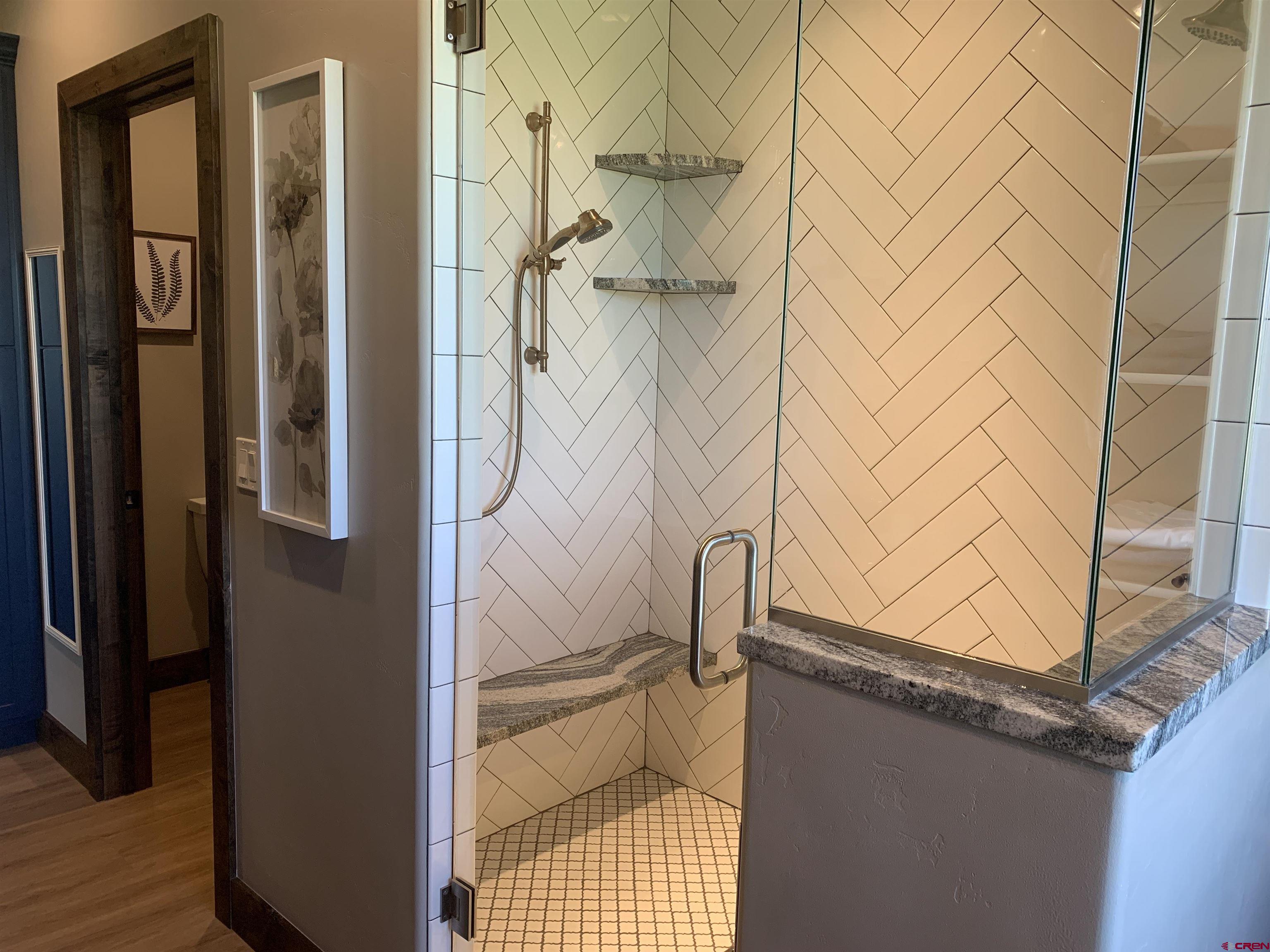 2533 Bear Lake Drive Montrose, CO 81401 - Photo 22 of 34 a bathroom with a shower