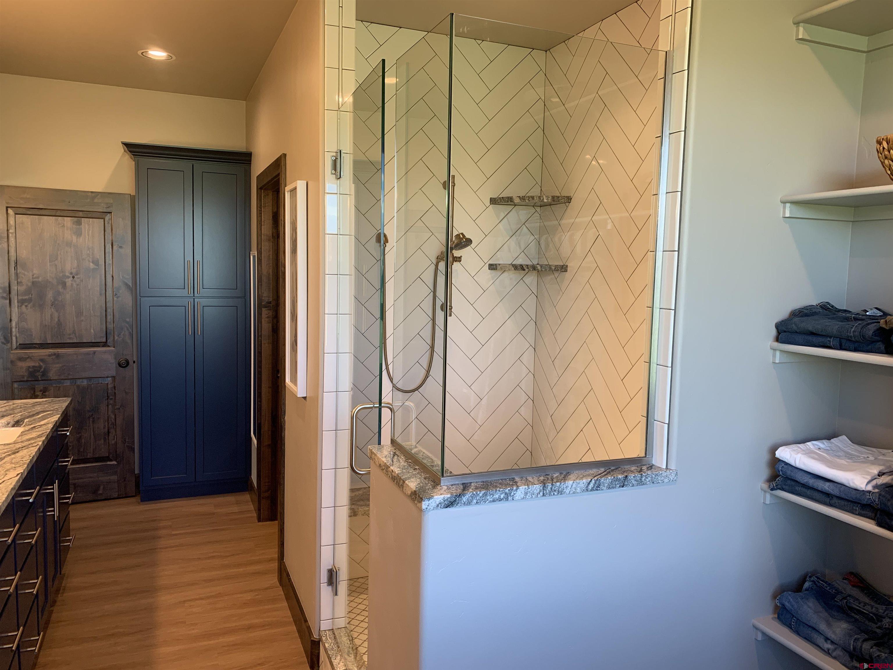 2533 Bear Lake Drive Montrose, CO 81401 - Photo 23 of 34 a bathroom with a shower and a toilet