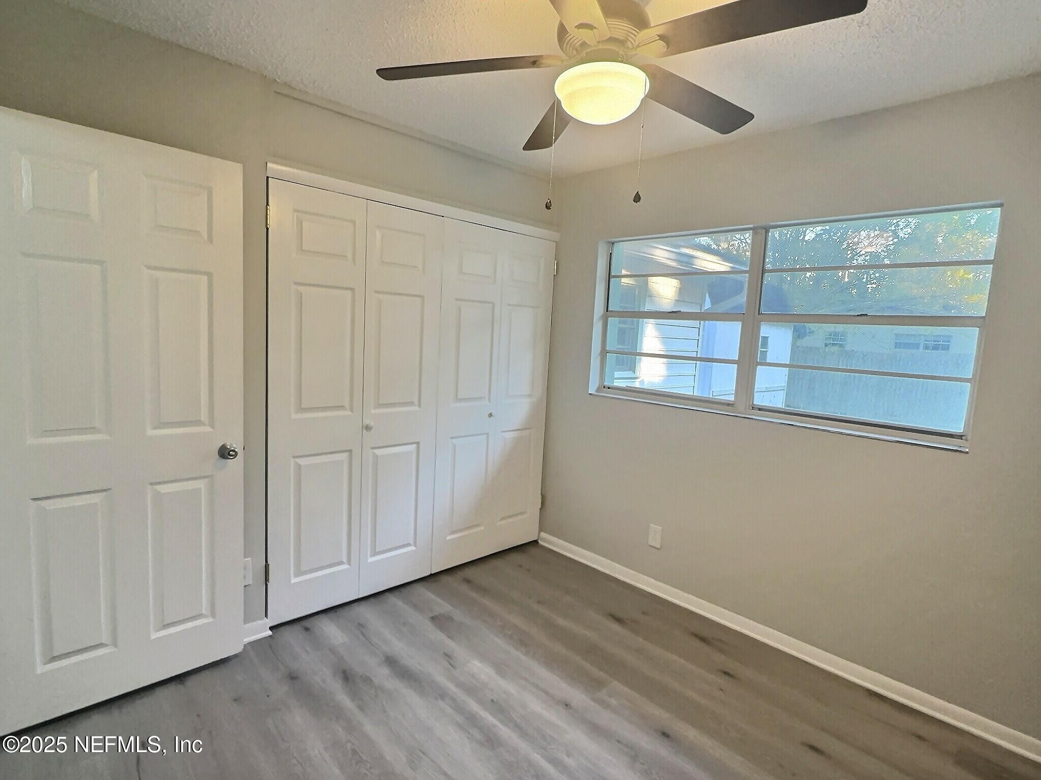 7456 Centauri Road Jacksonville, FL 32210 - Photo 16 of 26 a view of an empty room with a window