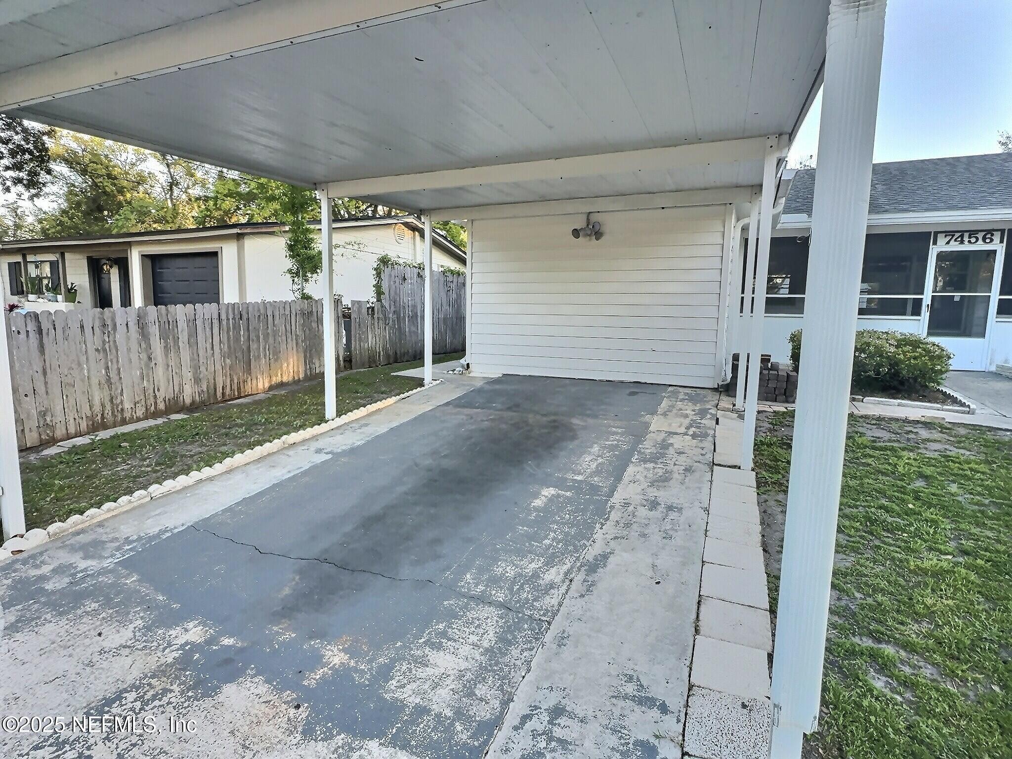 7456 Centauri Road Jacksonville, FL 32210 - Photo 2 of 26 a view of backyard of the house