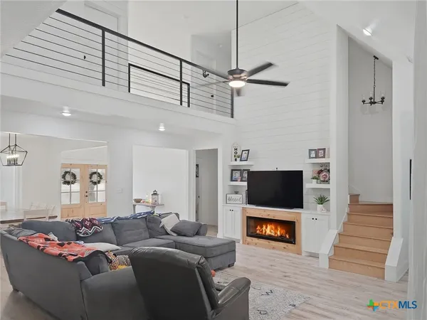 a living room with furniture and a couch