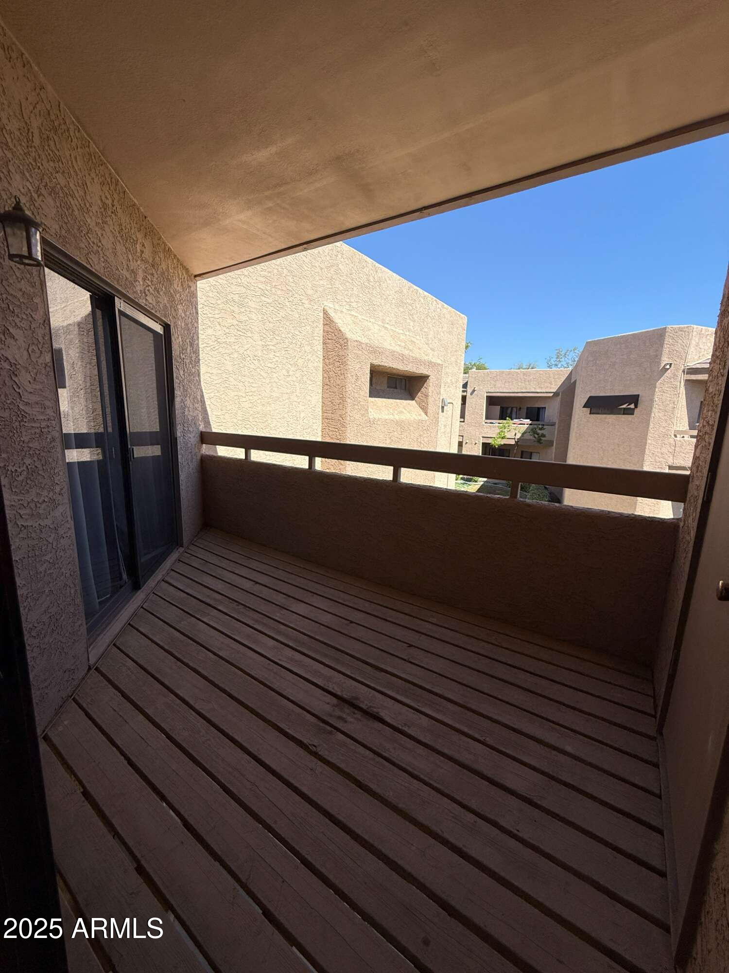 1287 North Alma School Road, Unit 207 Chandler, AZ 85224 - Photo 8 of 9 a view of a refrigerator from window