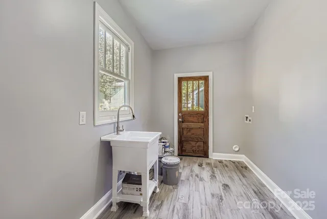 wooden floor and windows in a room