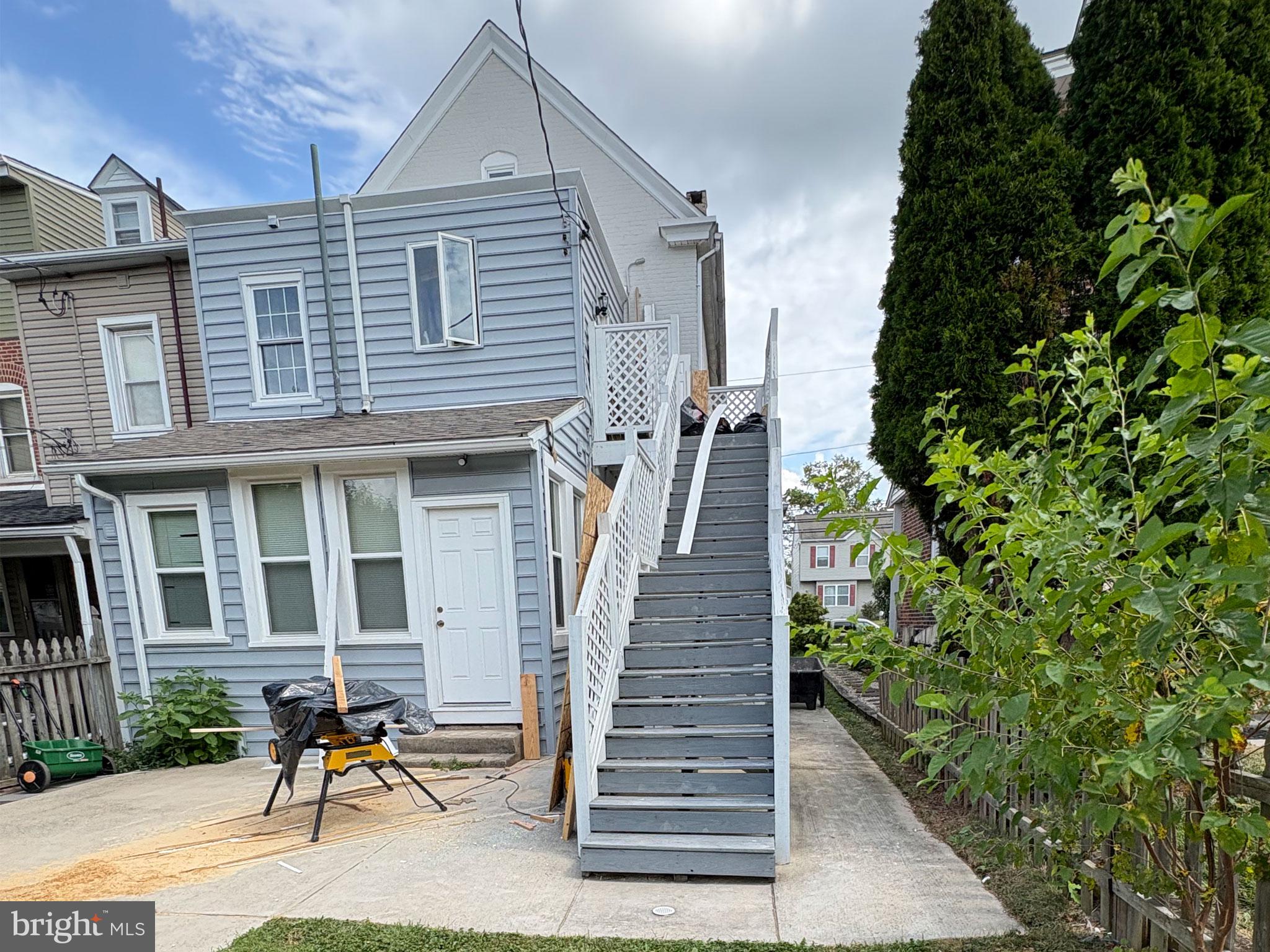 48 Penn Avenue, Unit A Souderton, PA 18964 - Photo 2 of 2 a view of a house with backyard and sitting area