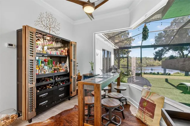 a view of a lake with houses in the back