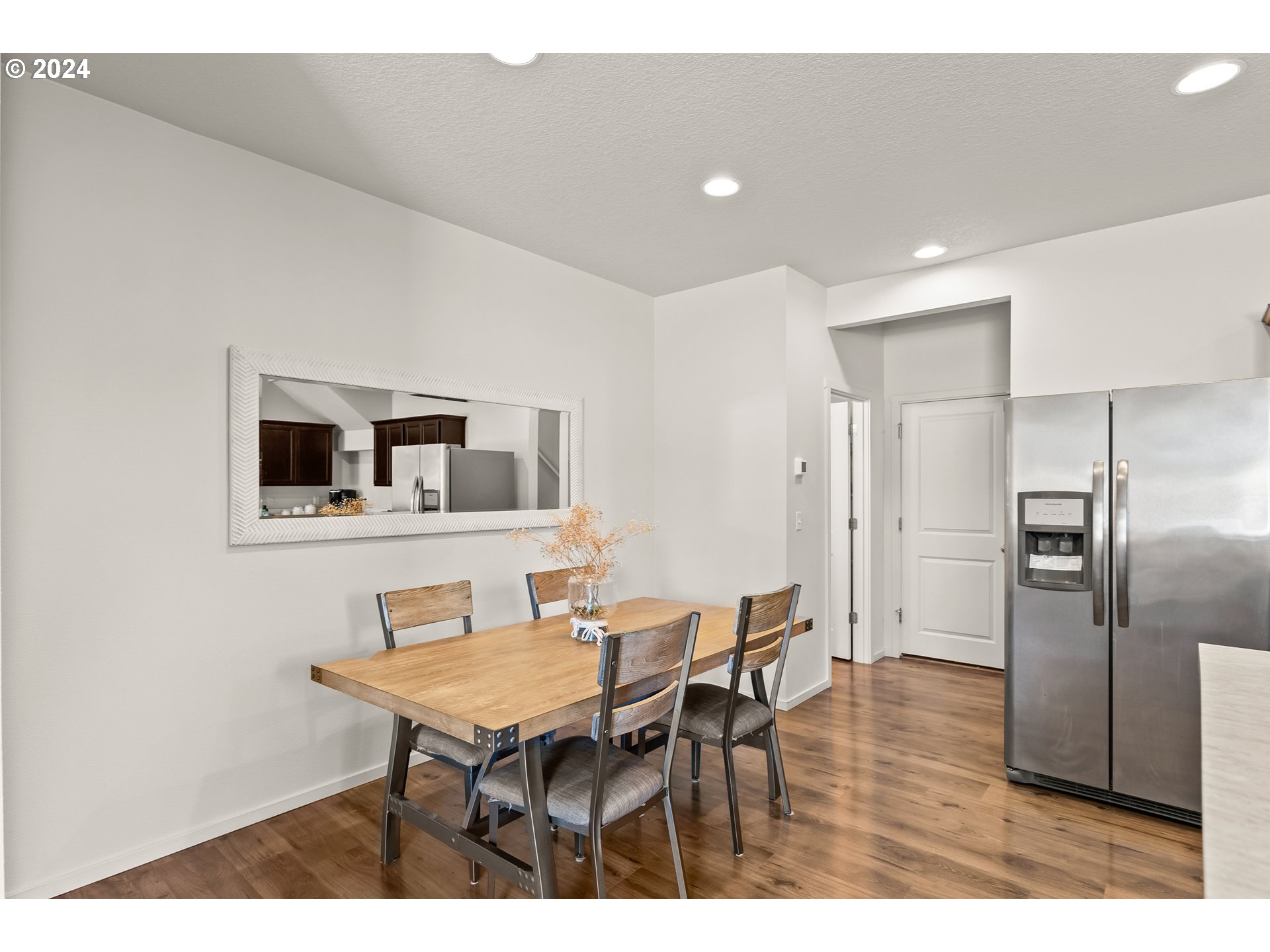 2183 Southeast 19th Street Gresham, OR 97080 - Photo 12 of 26 a dining room with furniture and a kitchen view