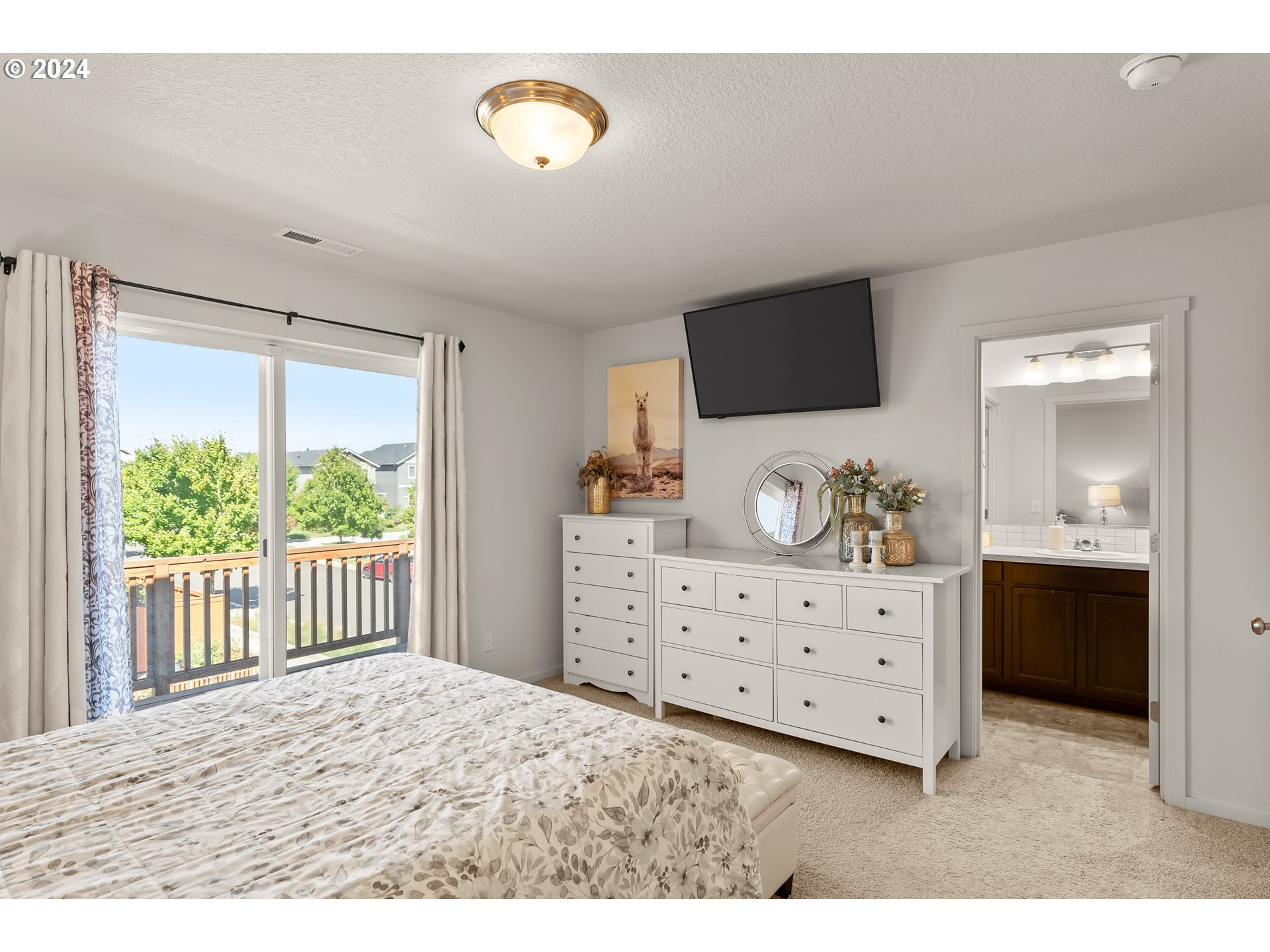 2183 Southeast 19th Street Gresham, OR 97080 - Photo 18 of 26 a bedroom with a bed closet and window