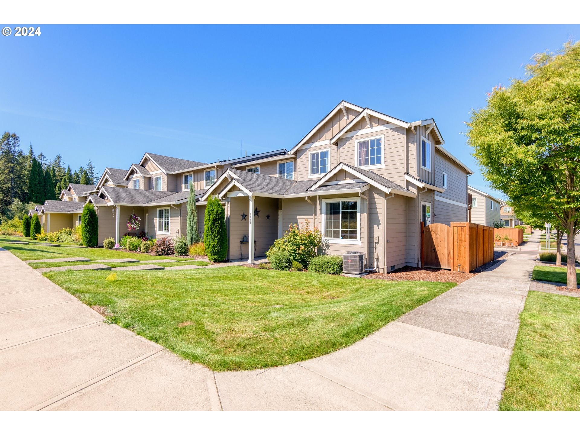 2183 Southeast 19th Street Gresham, OR 97080 - Photo 2 of 26 a front view of a house with garden