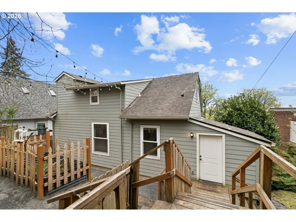 a view of house with outdoor space