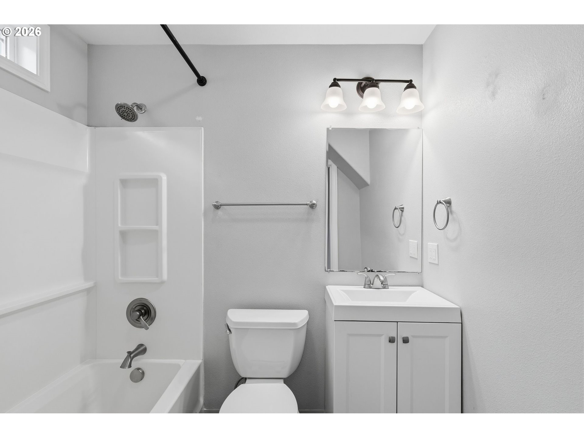 10505 Northwest 2nd Street Portland, OR 97231 - Photo 14 of 39 a bathroom with a sink mirror and toilet