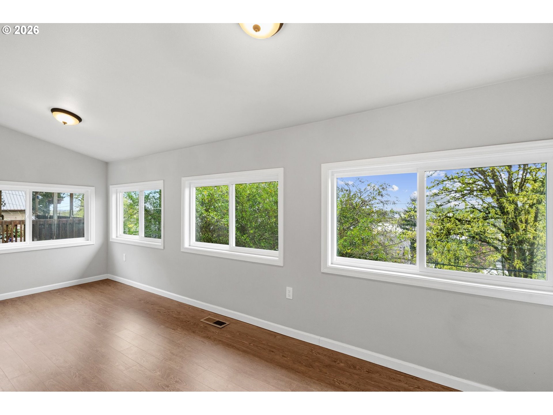 10505 Northwest 2nd Street Portland, OR 97231 - Photo 15 of 39 a view of an empty room with a window