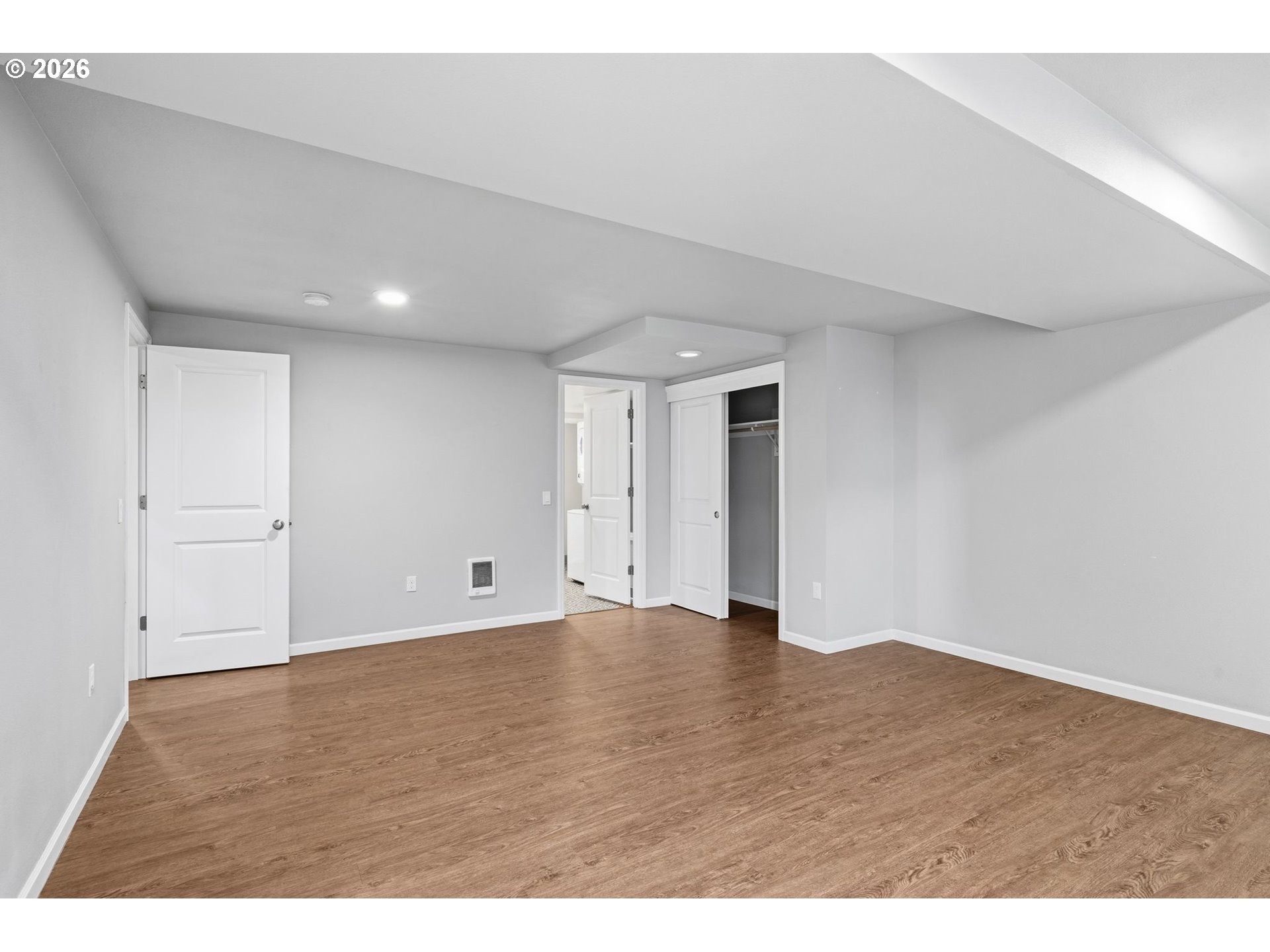 10505 Northwest 2nd Street Portland, OR 97231 - Photo 35 of 39 a view of an empty room with wooden floor
