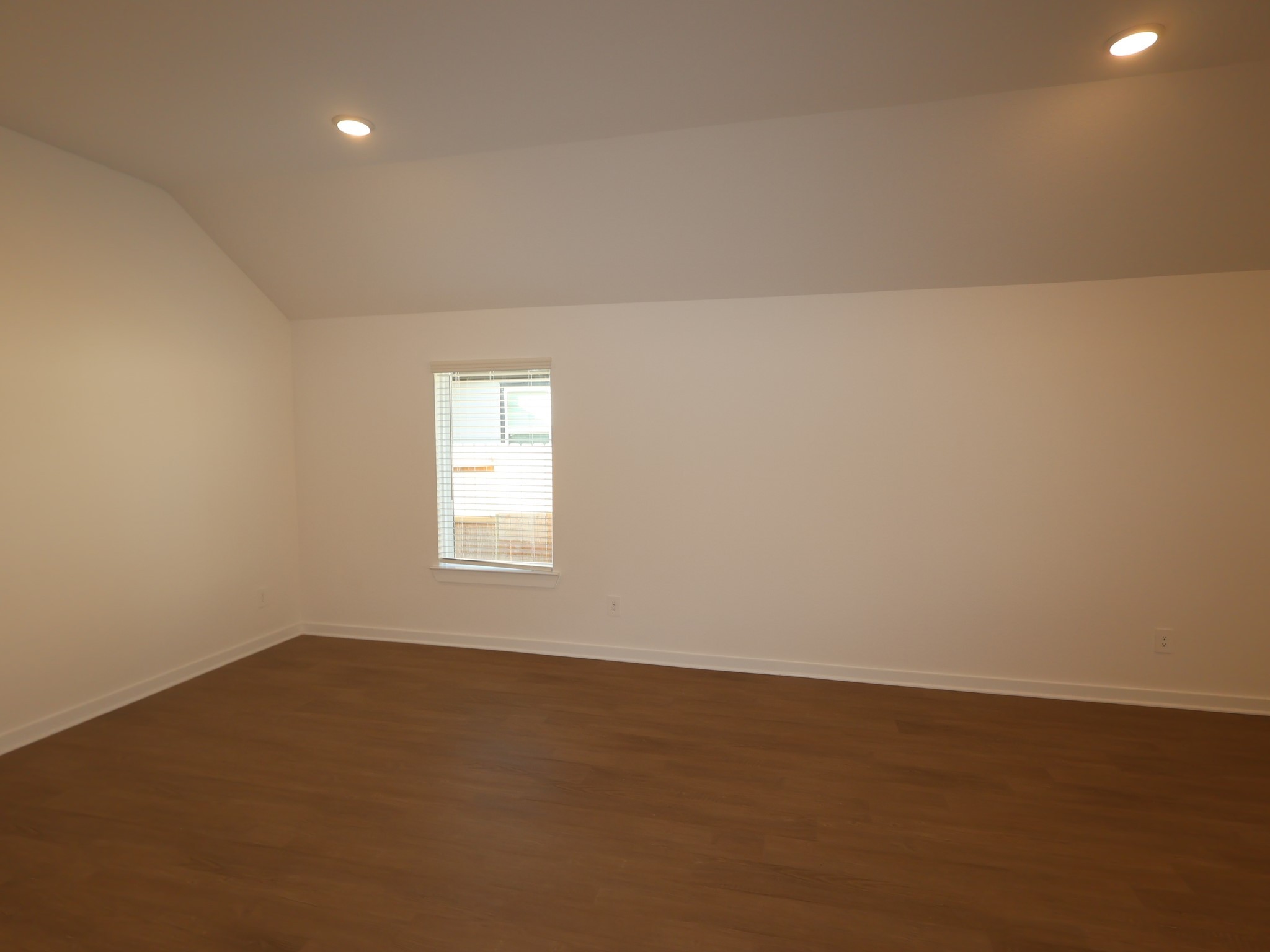 957 Garden Path Drive Willis, TX 77378 - Photo 14 of 37 an empty room with a window