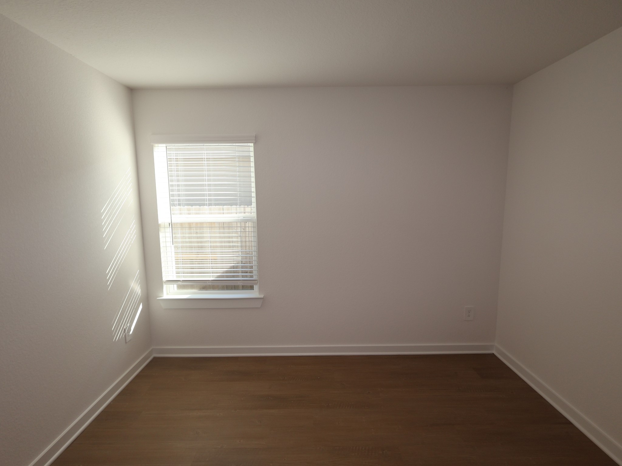 957 Garden Path Drive Willis, TX 77378 - Photo 23 of 37 an empty room with a window